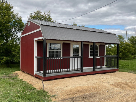 Barn Style Building with composite deck porch and aluminum railing